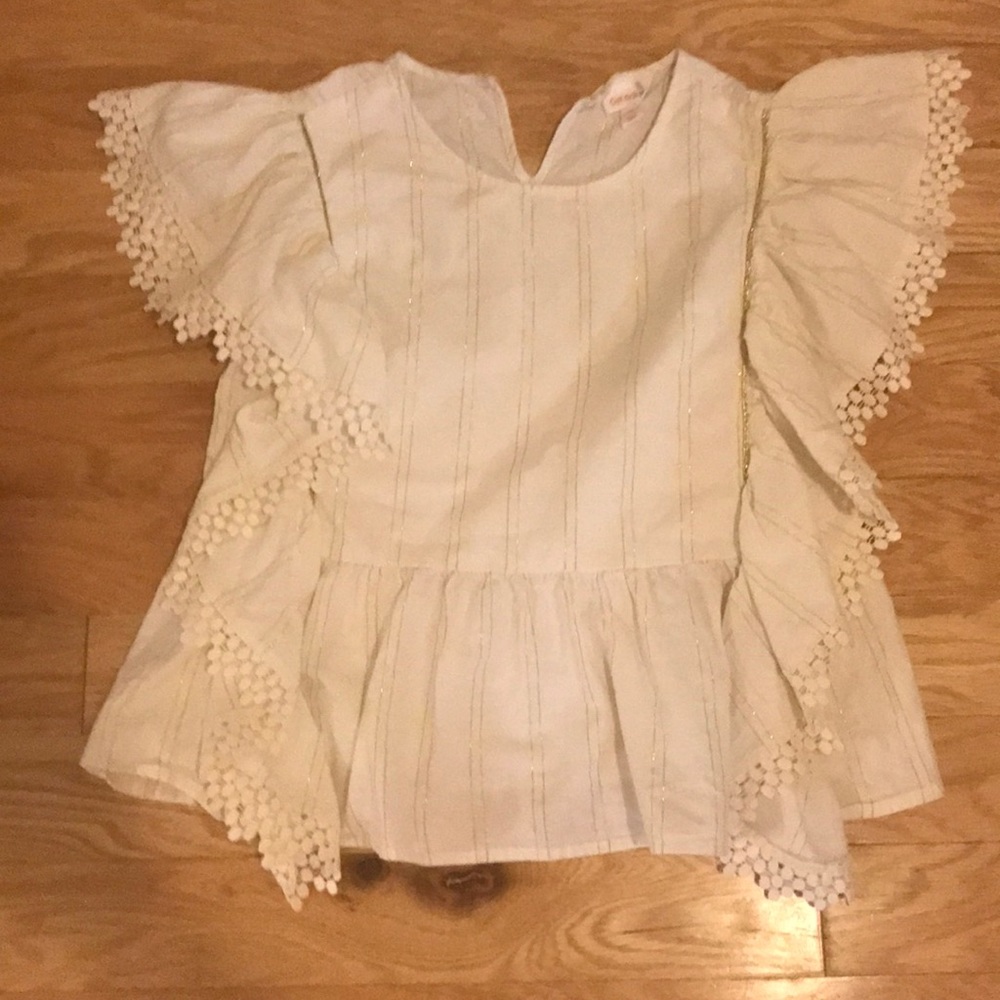 White and gold shirt